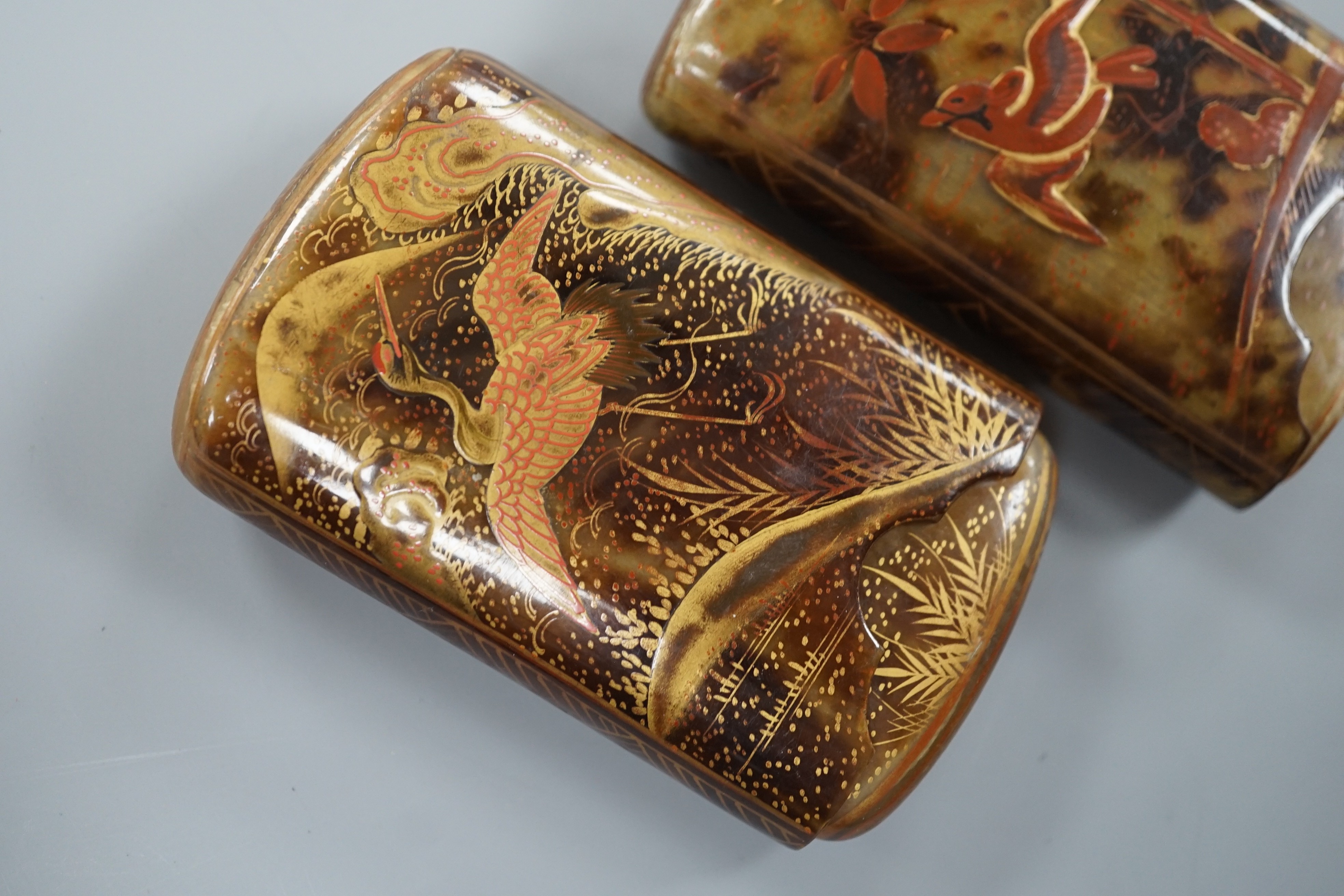 Two Japanese gilt lacquered tortoiseshell cigarette cases, 8 cm